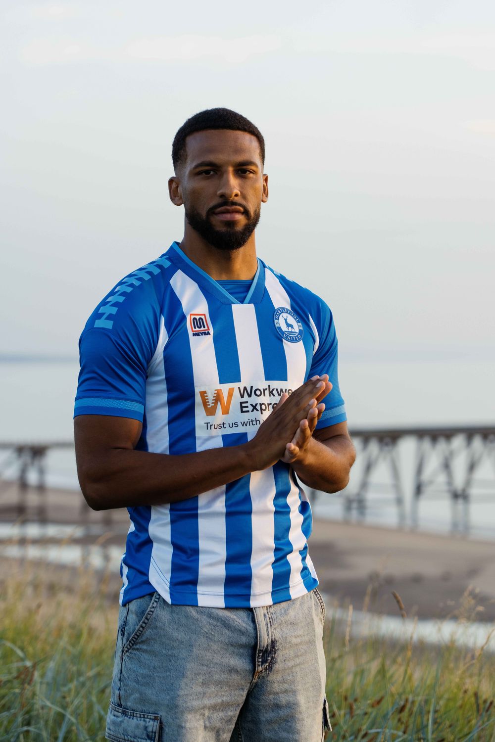 Reiss McNally models Hartlepool United's new MEYBA Home Kit for the 2026/27 season.