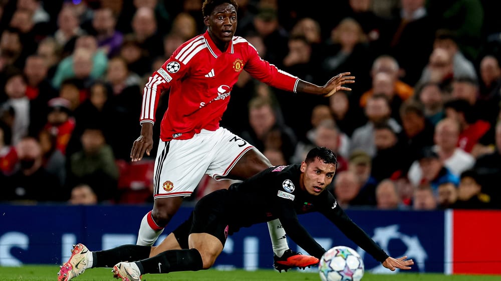 Manchester United midfielder Kobbie Mainoo (37) plays a pass during the Champions League match between Manchester United and Sabah at Old Trafford, Manchester, UK on 10 September 2026.