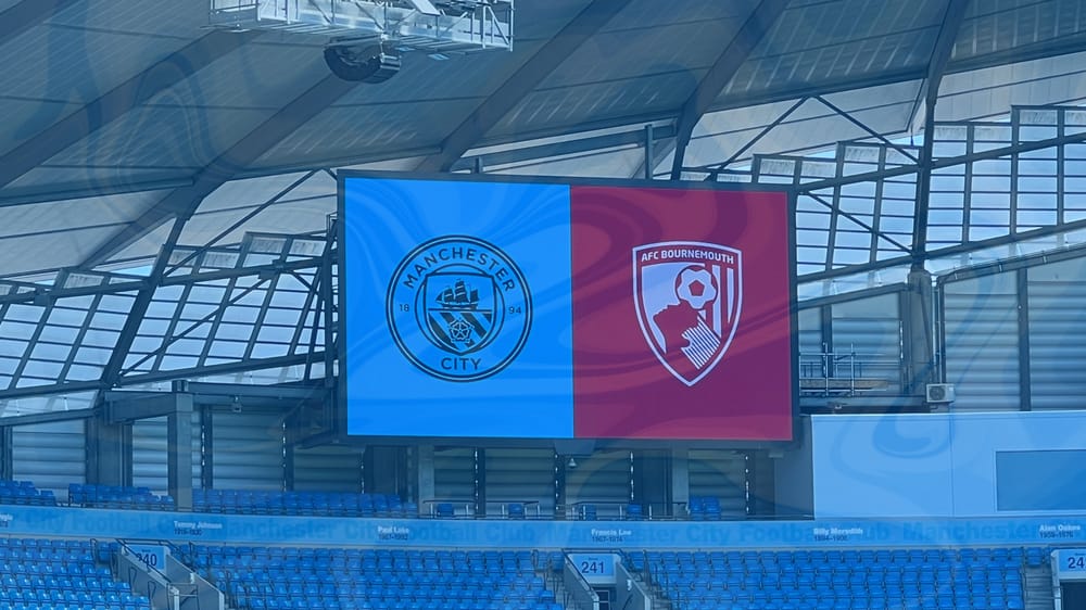 A graphic showing the scoreboard at the Etihad which displays the Manchester City and AFC Bournemouth badge