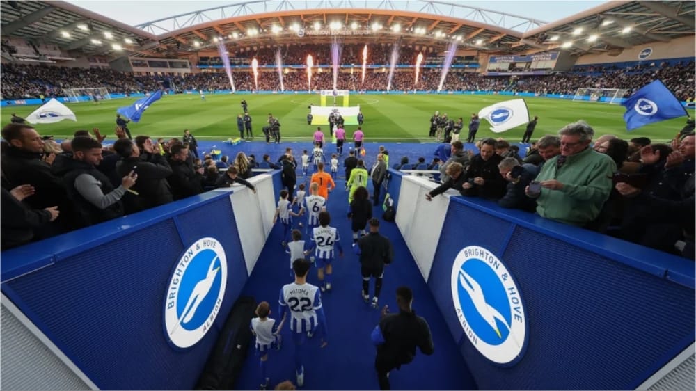 Players walking out at the Amex Stadium