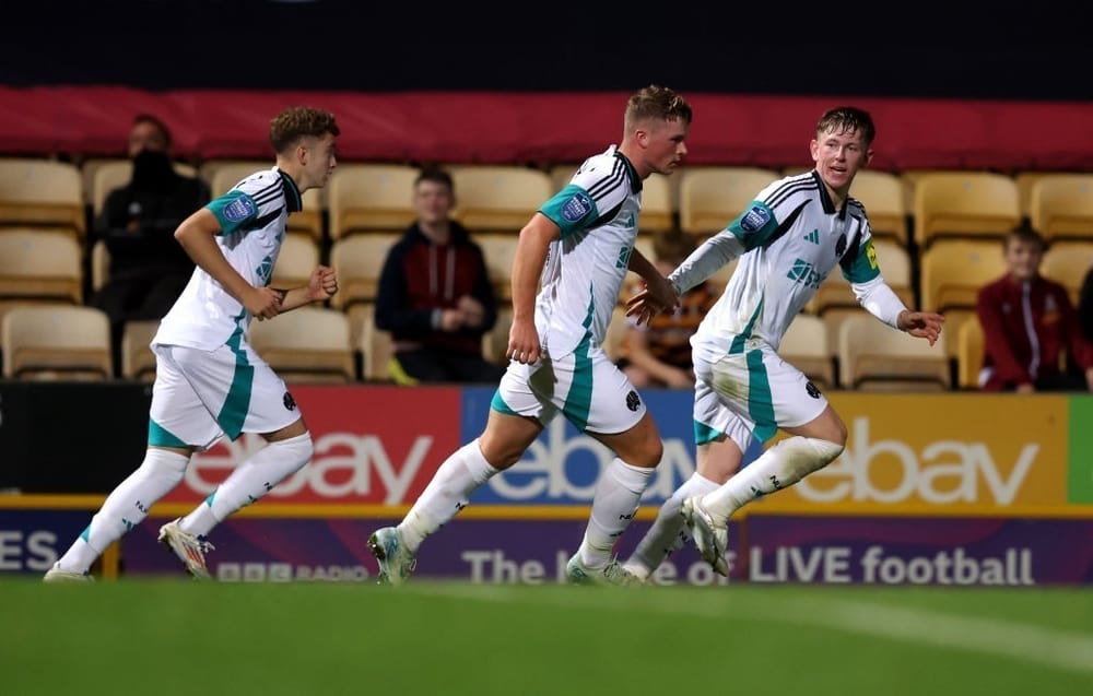 BRADFORD, ENGLAND - SEPTEMBER 03: Josh Donaldson of Newcastle United U21 celebrates scoring his team's second goal with teammates during the Bristol Street Motors Trophy match between Bradford City and Newcastle United U21 at University of Bradford Stadium, Valley Parade on September 03, 2024 in Bradford, England. (Photo by George Wood/Getty Images)