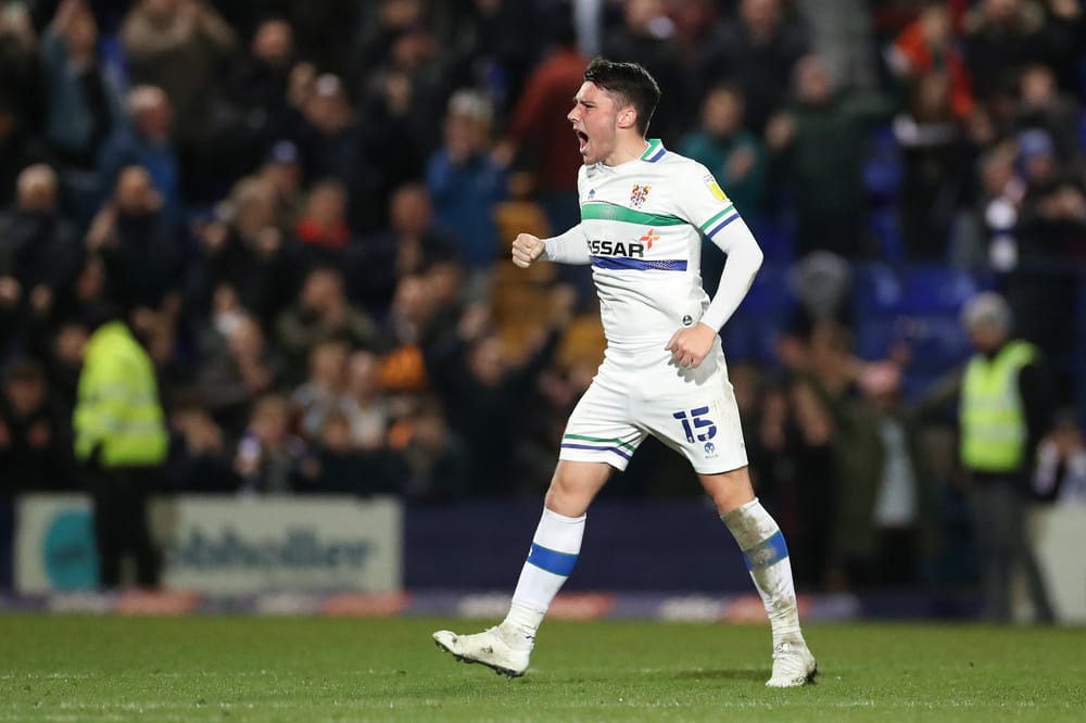BIRKENHEAD, ENGLAND - MARCH 11: Josh Hawkes of Tranmere Rovers celebrates their side's victory after the Sky Bet League Two match between Tranmere Rovers and Mansfield Town at Prenton Park on March 11, 2022 in Birkenhead, England. (Photo by Lewis Storey/Getty Images)