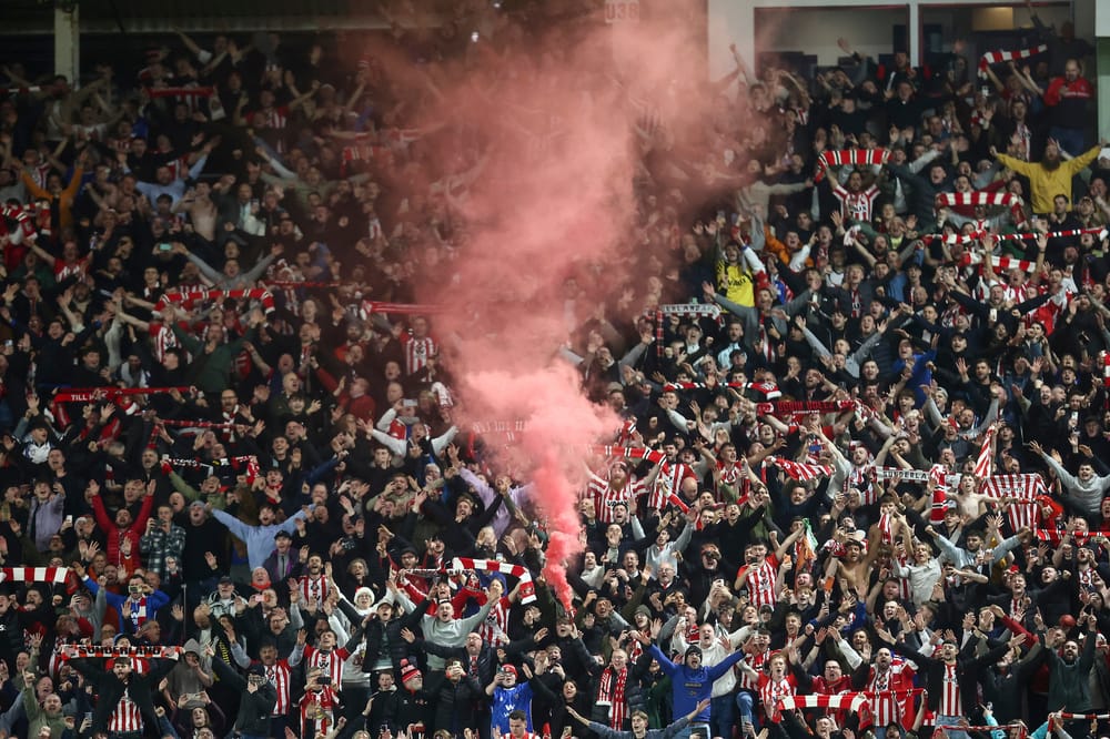 Sunderland fans celebrate during the Premier League match between Sunderland and Newcastle United at the Stadium Of Light, Sunderland, England on 14 December 2025.