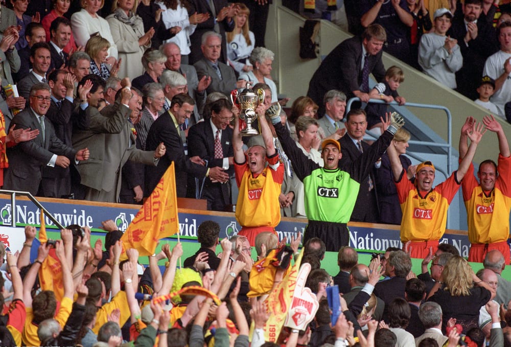Watford FC Season 1998-99      Division 1
Pic Alan Cozzi         31/05/1999
Watford v Bolton Wanderers   Play off Final.    Wembley         
Watford's Robert Page lifts the Division 1 play off trophy at Wembley